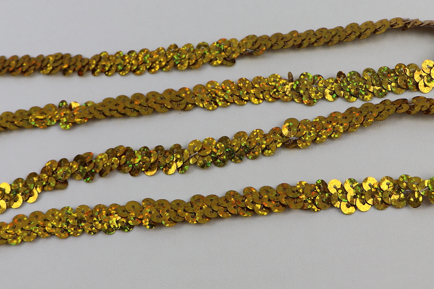 Paillettenborte holo elastisch "gold"