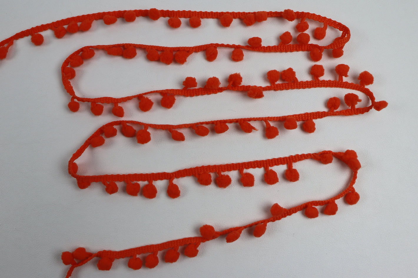 Pompon-Borte "orange"