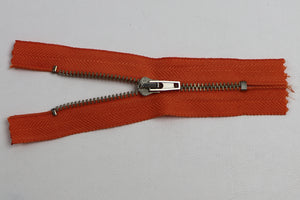 Reissverschluss mit Metallkrampe "orange"