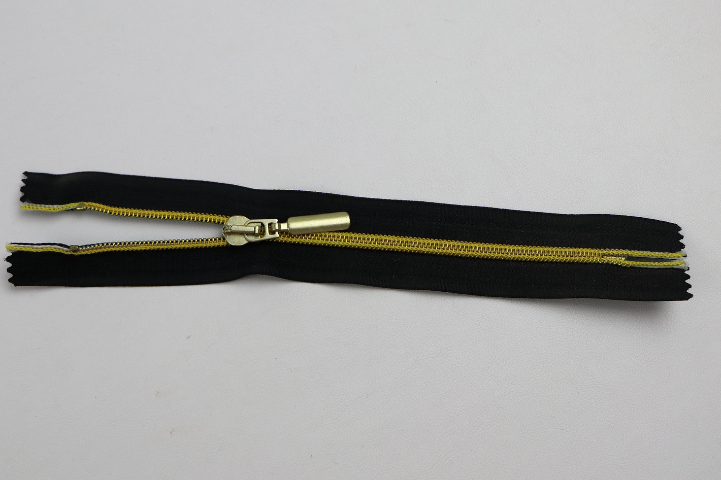 Reissverschluss Spirala "gold"