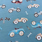 autos-vintage-hellblau-baumwolle-jersey-druck-stoff-stoffpradies-lyss